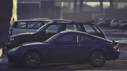 Calm urban setting with layered vehicles casting lengthy shadows at dusk Stock Footage 340660299