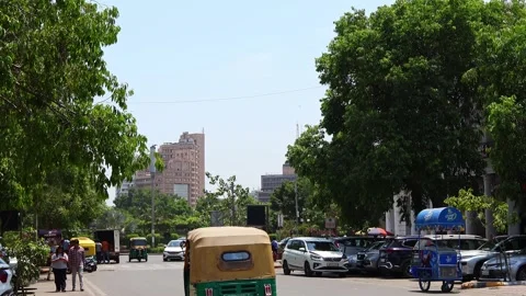 Calm vehicle daytime traffic near Connaught Place. Stock Footage 331600853