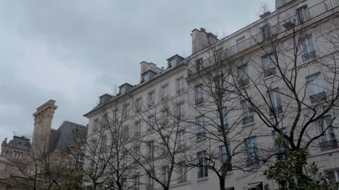 A calm view of the chapel and Haussmann buildings of Place de la Sorbonne Stock Footage 325843909