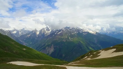 Calm view of mountain with cloud and green meadow 스톡 동영상 94771400