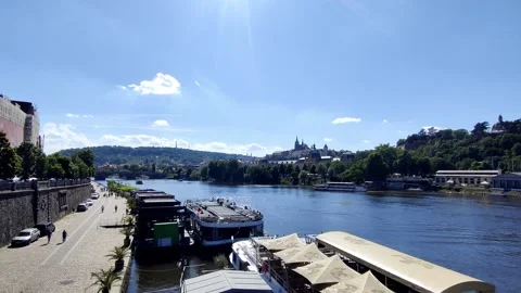 Calm Vltava River And Distant Bridges View From Prague Promenade - May 30 2026 Stock Footage 336385005
