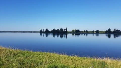 Calm water of the lake Stock Photos