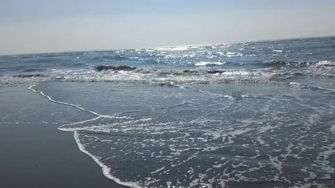 Calm water waves on the beach Video stock 274557742