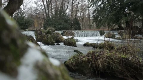 Calm waterfall during a cold winter day Stock Footage 148482975
