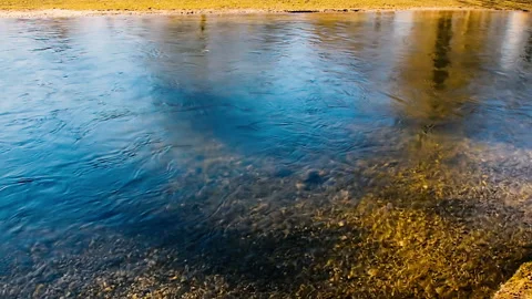 Calm waters of the Eisbach river in Munich, Germany. Video stock 141227541