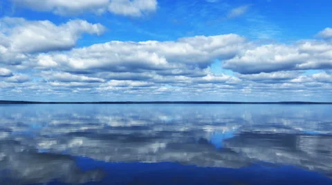 Calm Waterscape With Clouds Reflections in Water Surface Stock Footage 63649306