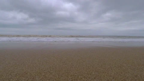 Calm wave coming towards the camera view while it moves away Stock Footage 133599108