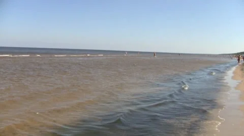  Calm waves are lapping at the seashore Stock Footage 26643074