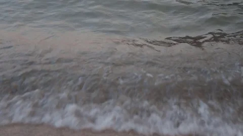 Calm waves on the beach, close up, Morning at sea, sunrise, looping Stock Footage 80230492