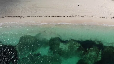 Calm Waves On Beach Drone Shot - Northwest Point Beach - T&amp;C, 4K Stock Footage 122264396