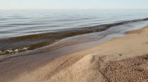 Calm waves on the beach Stock Footage 10574889