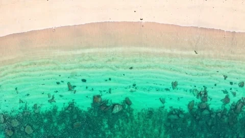 Calm waves breaking at sandy and rocky Amadores Beach Stock Footage 262423284