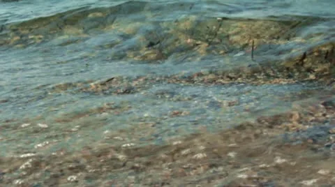 CALM WAVES COMES A SHORE Stock Footage 11498548