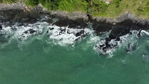 Calm Waves Crashing on Rocks Stock Footage 320988335