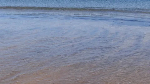 Calm waves crushing on a sand beach. Stock Footage 147571591