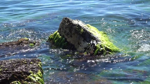 Calm waves hitting the rocks Stock Footage 68680496