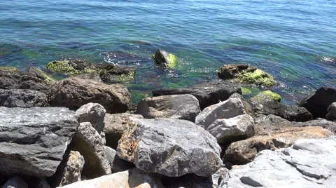 Calm waves hitting the rocks Stock Footage 68682064