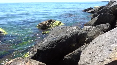 Calm waves hitting the rocks Stock Footage 68685837