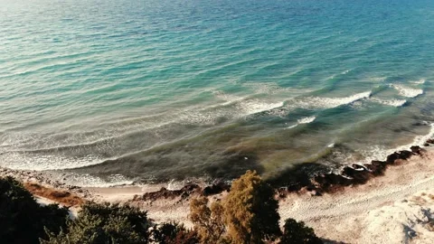 Calm waves hitting the shore Stock Footage 137561900