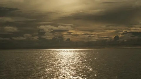 Calm waves of the sea during sunset. Beautiful pre-storm cloudy sky on the Stock Footage 278239725