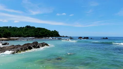 Calm waves splash on volcanic rocks on paradise Wediombo beach, Java, Stock Footage 169844364