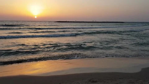 Calm waves at sunset in Tel Aviv Stock Footage 150461428