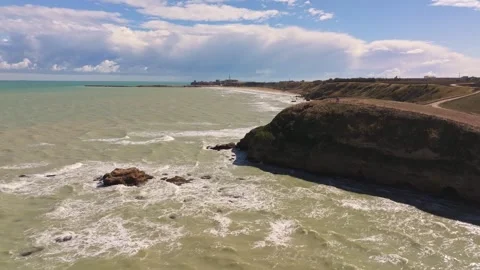Calm waves, warm colors, and timeless beauty at Punta Aderci. Stock Footage 319109407