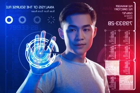 Calm web developer touching the screen while scanning his hand Stock Photos
