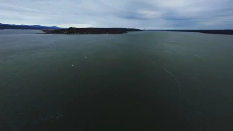 Calm winter river aerial with distant skyline Stock Footage 320849560
