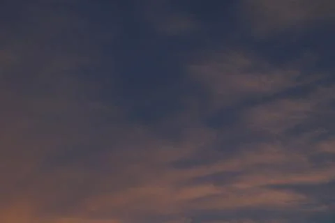 A Calm Yet Dramatic Blue and Orange Gradation Sky for A Beautiful Evening Stock Photos