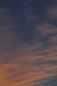 A Calm Yet Dramatic Blue and Orange Gradation Sky for A Beautiful Evening Stock Photos