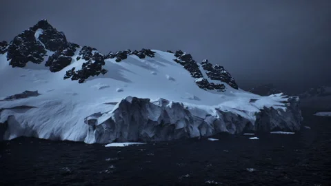 Calm yet formidable glaciers with sharp structures and violent weather patterns 스톡 동영상 331520783