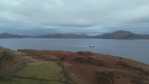 Calmac Ferry revealed over Scottish Island Isle of Mull Stock Footage 260542029