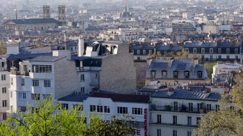 Calming and beautiful view of Paris buildings with blue roofs from Montmartre Stock Footage 310347770