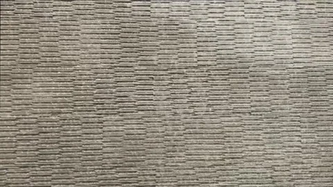 A calming and seamless close-up loop of water gently cascading down Stock Footage 318834972