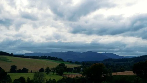 Calming Clouds Over the Mountains in Rural Scotland, Farmland Time Lapse Stock Footage