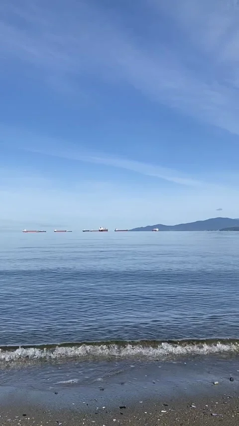 Calming Crystal Clear Waves With a Blue Sky Stock Footage 277955332