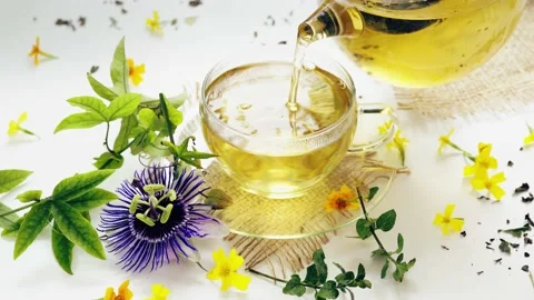 Calming herbal tea with the leaves of the passion flower Stock Footage 220155366
