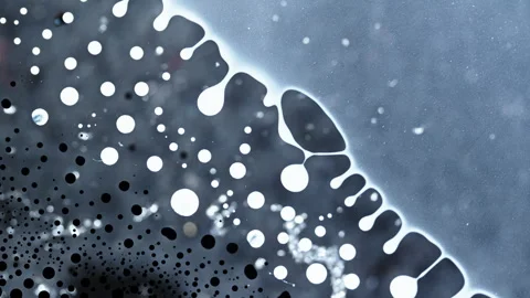 Calming Macro Shot of Abstract Ink Mixing with Bubbles Stock Footage 328358433