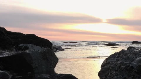 Calming Ocean waves and a beautiful sunset Stock Footage 225371202