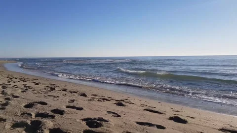 Calming Ocean Waves Under Blue Sky Stock Footage 307908628