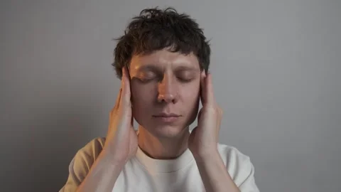 Calming temple massage to ease headache and mental pressure Stock Footage 322628068