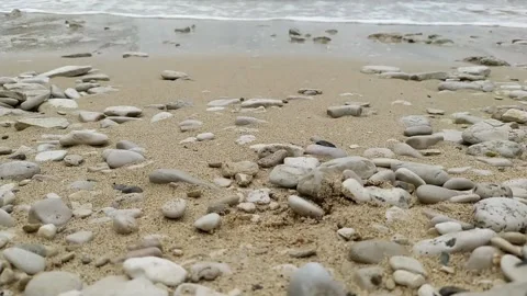 Calming waves splashing to the sand beach in Croatia Stock Footage 147140150