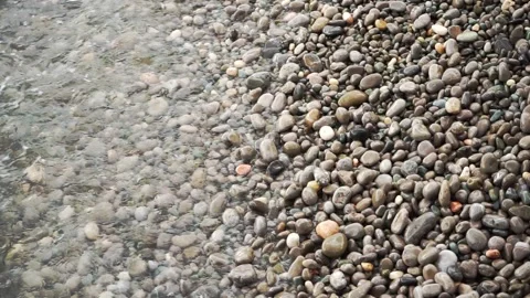 Calmly oncoming and rolling waves of the Black Sea on a pebble beach. Stock Footage 163160414