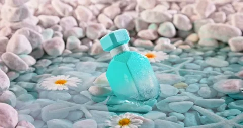 Calone blue perfume in environment of white stones and sea. Stock-Footage 335108687