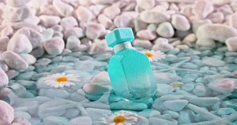 Calone blue perfume in environment of white stones and sea. Stock-Footage 337072687