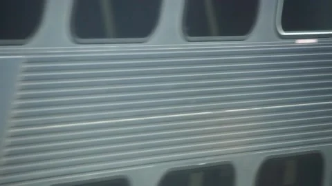 Caltrain being passed by opposing Caltrain on adjacent track Stock Footage 236536159