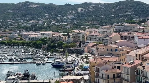 Calvi Corsica panoramic view of harbor of city with port and houses at sunny day Stock Footage 340074384