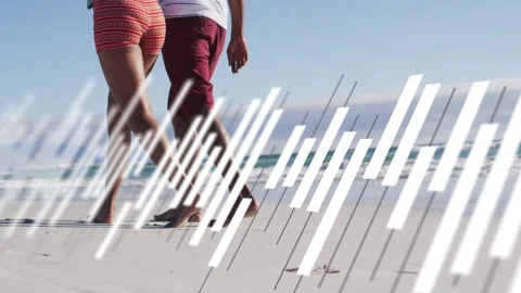 Cam pulling back showing couple walking along beach white bars partly obscuring Stock Footage 333414387