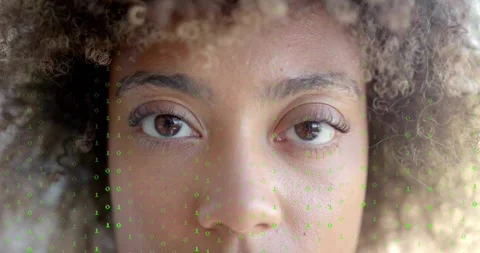 Cam pulling back, woman opening eyes then closing while binary overlay Stock Footage 320626551